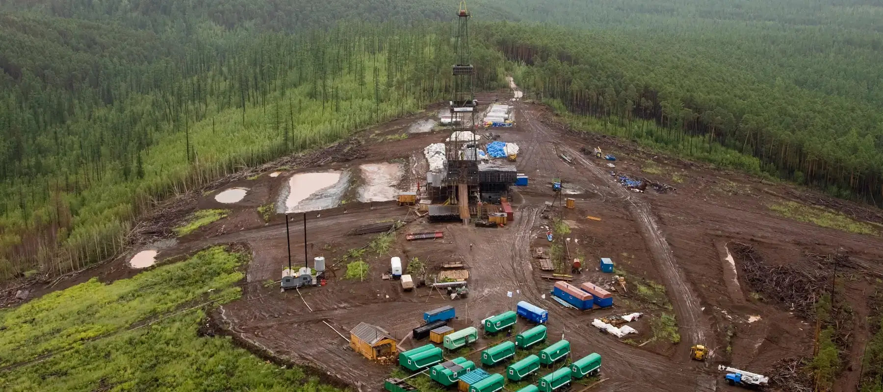Isolated worksite in rugged terrain highlighting the need for G150 hybrid GPS tracking with Iridium backup for reliable location monitoring beyond cellular range