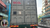 Rear view of a shipping container on a truck with a close-up of a security seal, representing GPS tracking solutions for monitoring container movements and cargo protection.