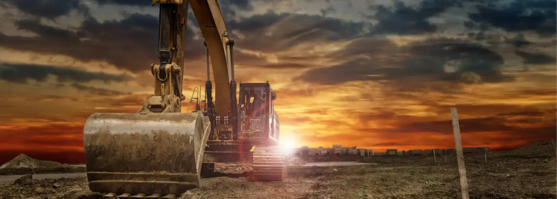 Excavator at a construction site during sunset, showcasing GPS equipment tracking for plant, machinery, and fleet management across Australia.